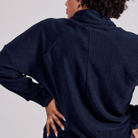 haut en sherpa avec manches longues et poches