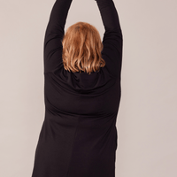 Tunique en molleton noir avec poches et col à cordons