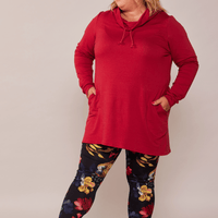 Tunique en molleton rouge avec poches et col à cordons