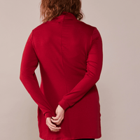 Tunique en molleton rouge avec poches et col à cordons