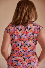 Combinaison jupe-culotte à motifs fleuris dans les teintes de rose, fait au Québec, Canada.